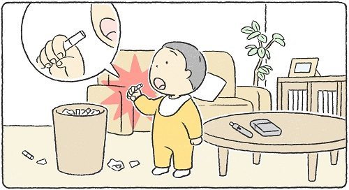 図:ゴミ箱の中に入っていたたばこの吸殻を、子どもが口に入れようとしているイラスト