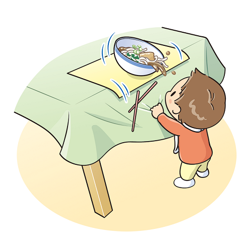 子どもが、テーブルの下からテーブルクロスを引っ張っている。その上のうどんがひっくり返り、中身が下にいる子どもにかかりそうになっているイラスト