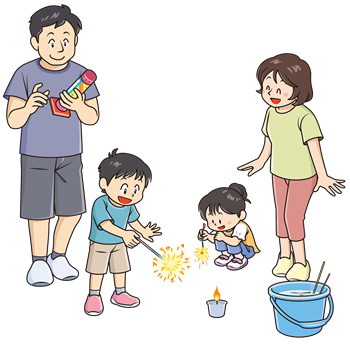 家族4人で安全に花火をしている様子