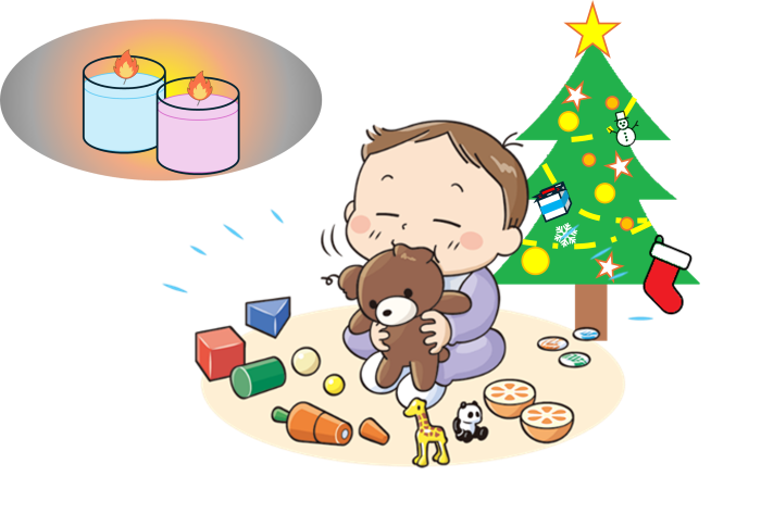 図:こどもがおもちゃを口に入れている様子